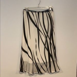 Soprano black and cream skirt. Size small/medium.